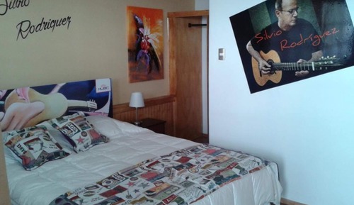 Habitación superior, varias camas