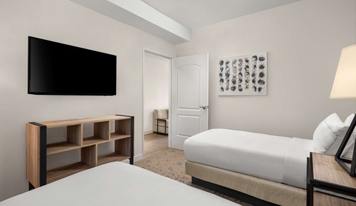 Suite, varias camas, en esquina