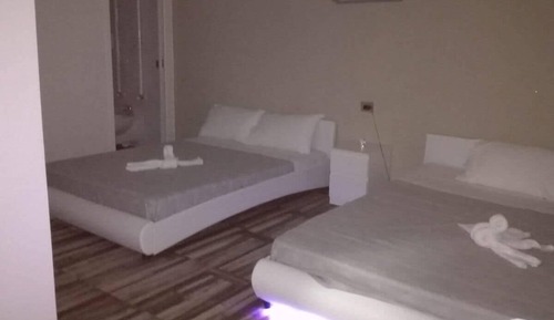 Habitación cuádruple Deluxe