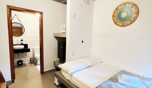 Habitación cuádruple Deluxe, vistas al jardín