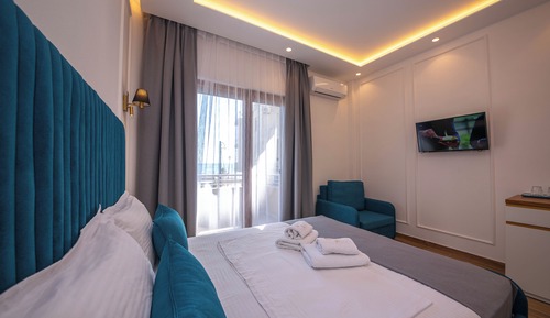 Habitación cuádruple, balcón, vistas al mar