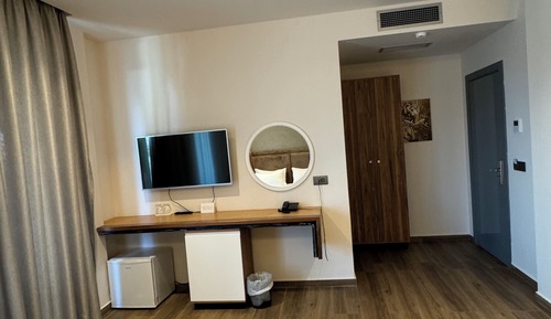 Habitación triple Deluxe, balcón, planta baja