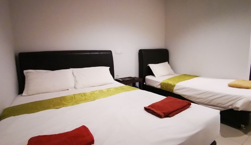 Habitación triple Deluxe