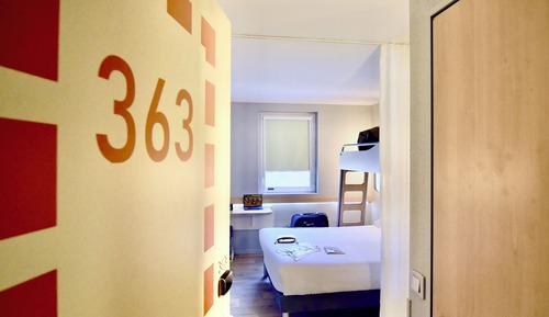 Habitación triple, varias camas