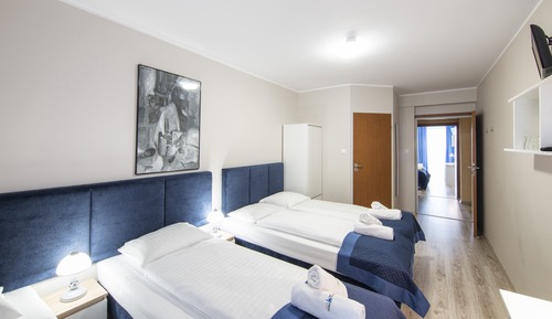 Habitación cuádruple familiar, varias camas
