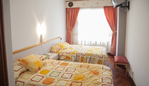 Habitación con 2 camas individuales