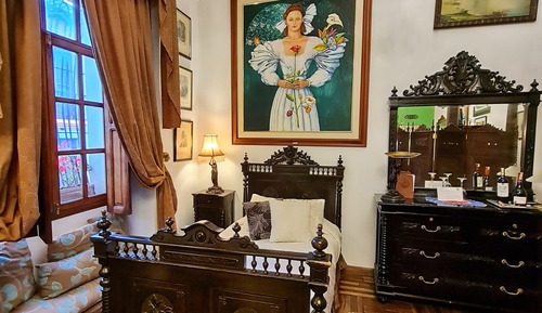 Habitación triple Deluxe, varias camas
