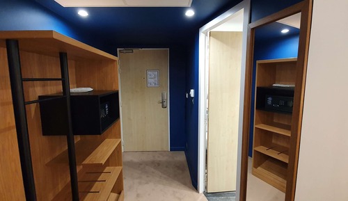 Habitación triple, varias camas