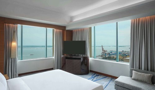 Suite, acceso al Business Lounge, vistas al puerto
