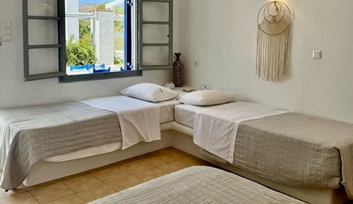 Habitación cuádruple Confort, vistas parciales al mar