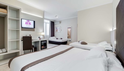 Habitación familiar, varias camas
