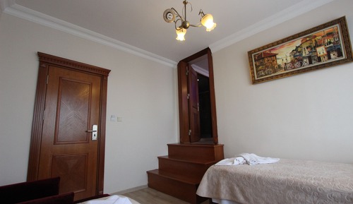 Habitación cuádruple Deluxe