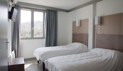Habitación con 2 camas individuales, vistas a la ciudad