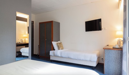 Habitación triple familiar, varias camas