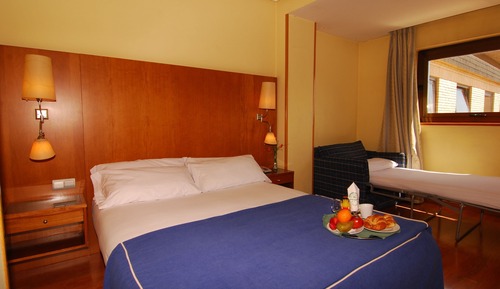 Habitación superior con 1 cama doble o 2 individuales