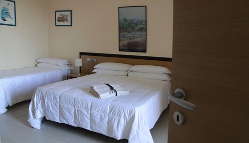 Habitación triple, patio, planta baja