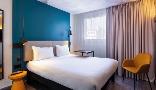 Habitación estándar con 2 camas individuales, varias camas