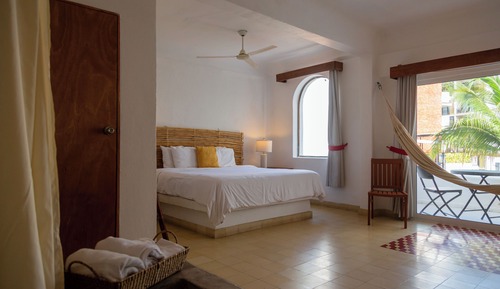 Premium Partial Ocean View Balcony 1 King Bed