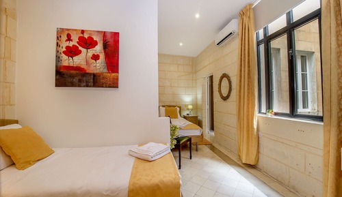 Habitación con 2 camas individuales