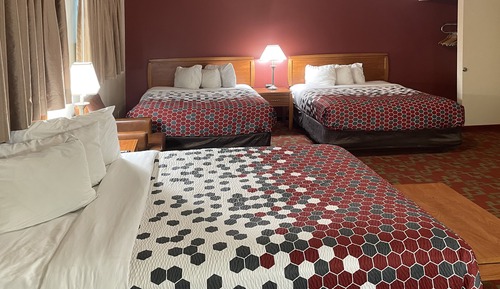 Habitación, varias camas