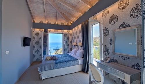 Suite exclusiva, 1 cama de matrimonio, vistas al mar, en esquina