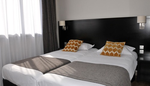 Habitación, varias camas