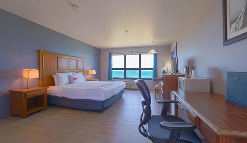 Habitación, 1 cama de matrimonio grande, vistas parciales al mar
