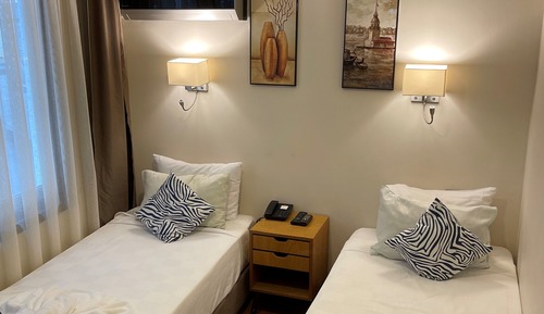 Habitación con 2 camas individuales