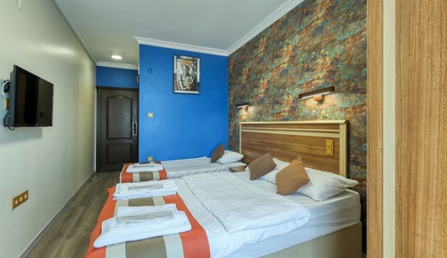Habitación triple estándar, varias camas