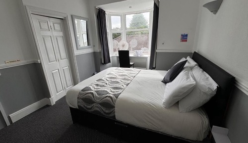 Habitación estándar con 1 cama doble o 2 individuales