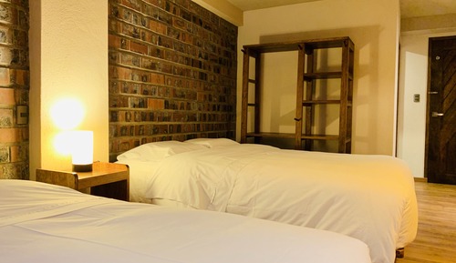 Habitación triple básica, varias camas