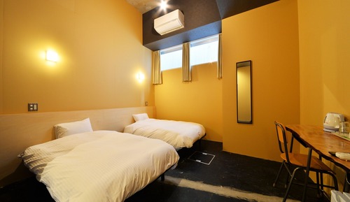 Habitación con 2 camas individuales