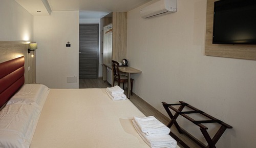 Habitación Business con 1 cama doble o 2 individuales