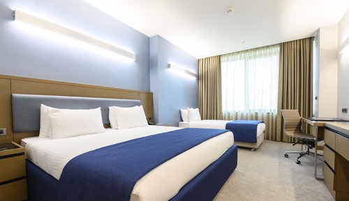 Habitación Deluxe, varias camas