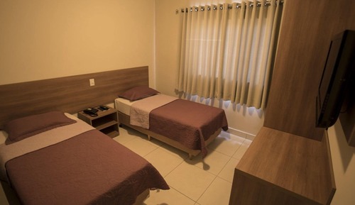 Habitación estándar con 1 cama doble o 2 individuales