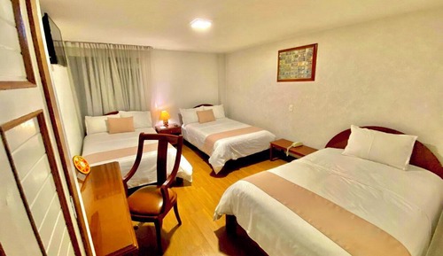 Habitación triple ejecutiva