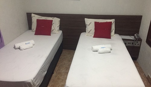 Habitación con 2 camas individuales