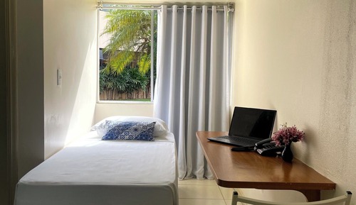 Habitación triple, varias camas