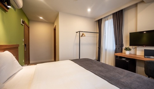 Habitación superior con 1 cama doble o 2 individuales