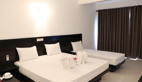 Habitación triple Deluxe