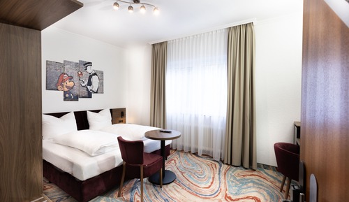 Habitación estándar con 1 cama doble o 2 individuales