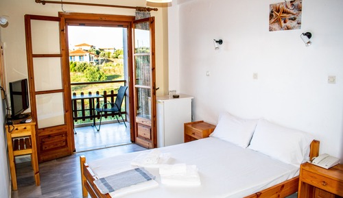 Habitación triple, vistas al mar