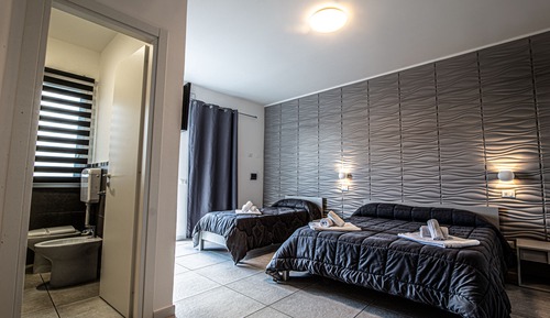 Habitación triple Deluxe, vistas al jardín