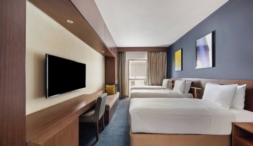 Habitación Deluxe, varias camas