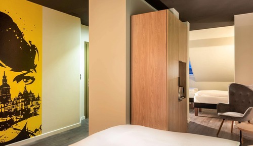 Habitación triple, varias camas