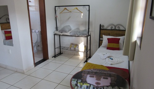 Habitación triple, varias camas