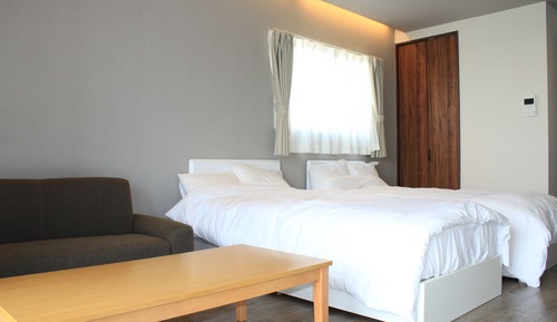 Habitación con 2 camas individuales, vistas al mar