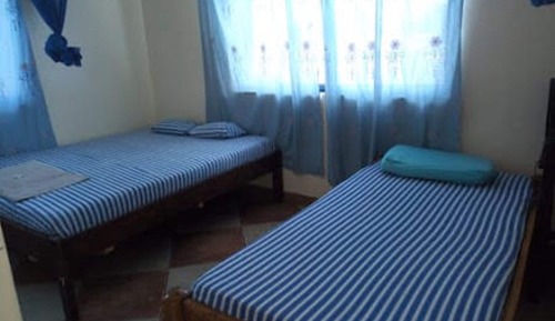 Habitación con 2 camas individuales