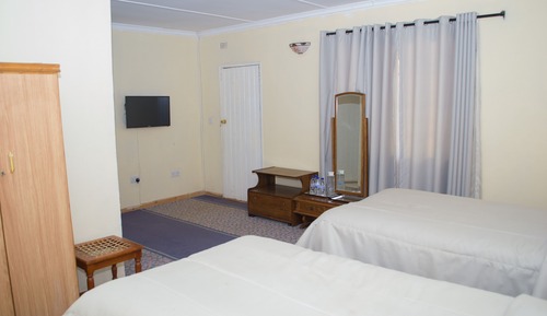 Habitación estándar con 1 cama doble o 2 individuales