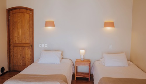 Habitación superior, varias camas